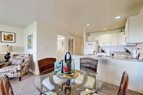 Open-plan interiors blend conversation seating with nearby culinary preparation spaces