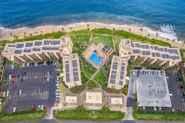 Overhead Aerial View Of Resort Grounds And Pool Layout