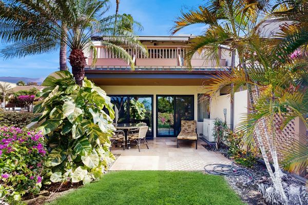 Step outside to lush tropical gardens