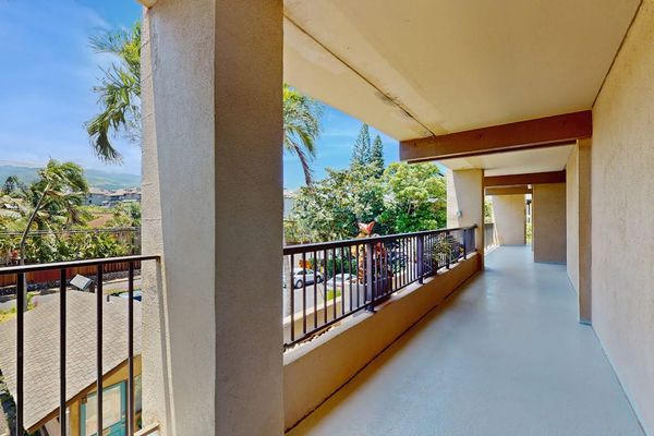 Walk through the open-air hallway surrounded by tropical scenery and fresh island breezes.