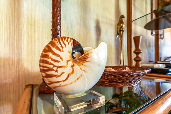 Thoughtfully selected island-inspired décor adds a touch of tropical charm.
