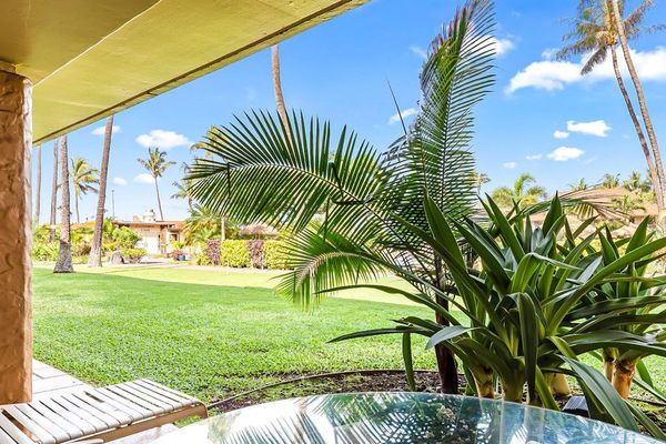 Step outside to a spacious tropical lawn just beyond your private lanai.