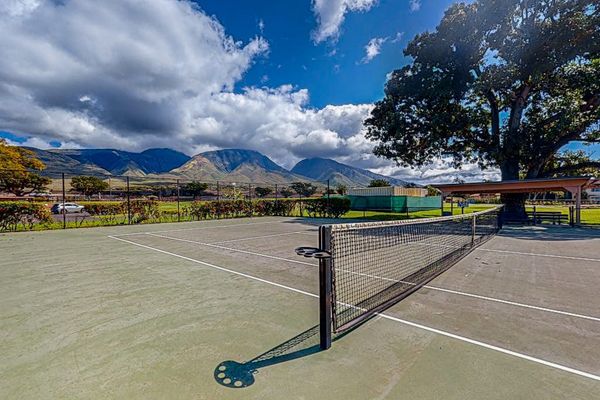 Enjoy a game of tennis while taking in beautiful mountain views.