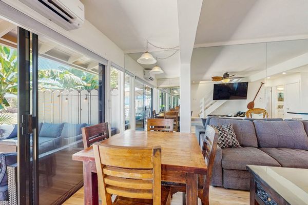 The dining area offers the perfect setting for family meals and conversation.
