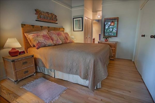 Comfortable king bed with fresh linens for restful nights and peaceful mornings