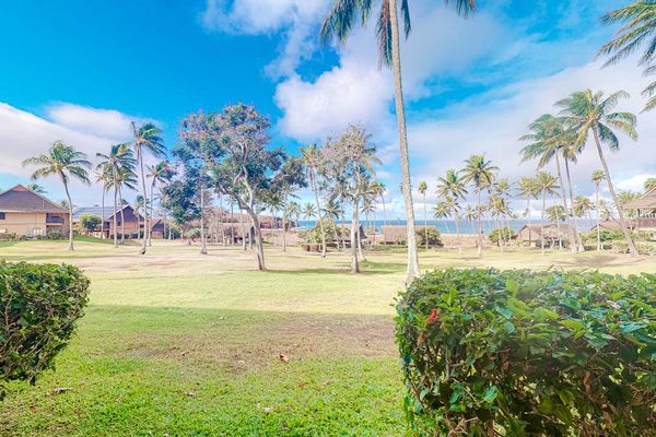 Lush resort greenery creates a peaceful setting for relaxing island escapes together