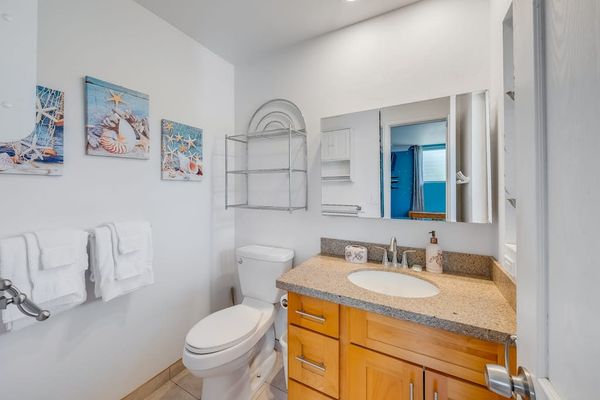 Clean half bathroom creates a welcoming space for quick refreshes and daily convenience