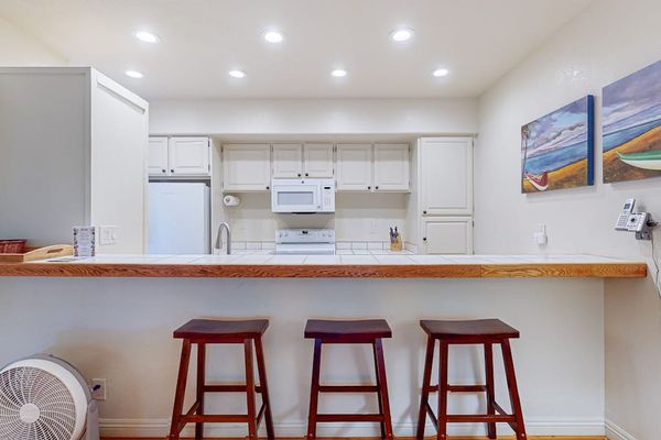 Open kitchen includes an extra dining area for added comfort during your stay
