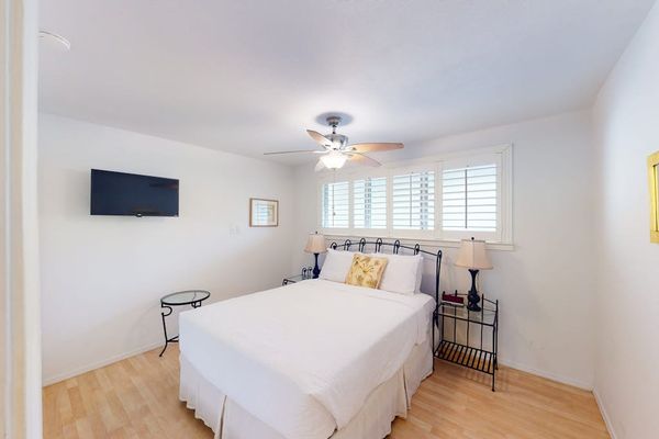 Comfortable bedroom features a Queen bed