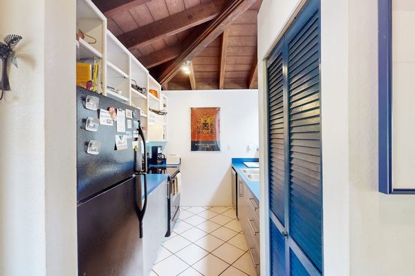 Well equipped kitchen provides practical space for preparing island meals