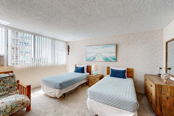 Natural light fills the sleeping area, creating a bright and inviting space to unwind.