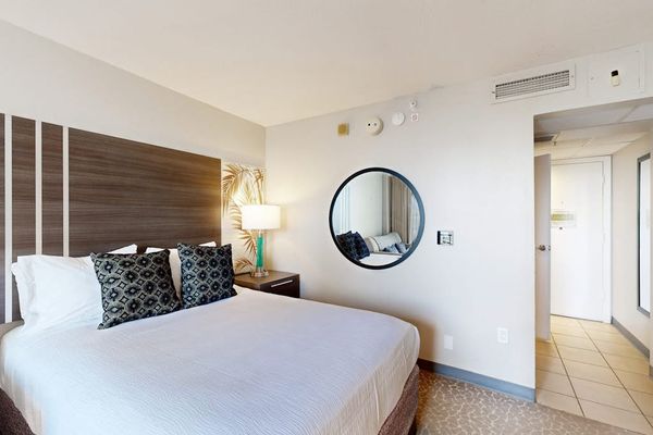 A comfortable sleeping space offering the perfect place to unwind and recharge after a day of activities.