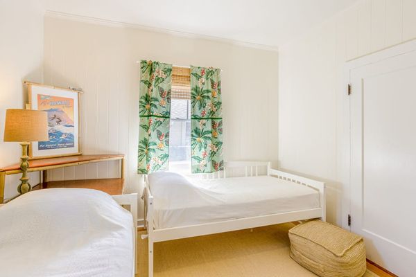 Two twin beds in second bedroom accommodate everyone comfortably nightly