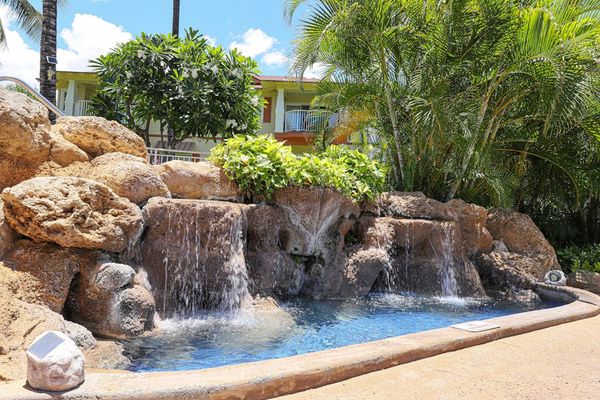 Cool off, relax, and soak up the sun in the inviting shared pool area.