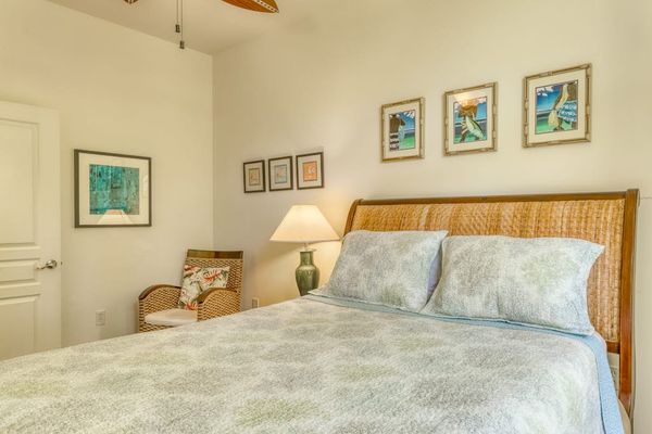 Enjoy a peaceful night’s sleep in a cozy room with a comfortable queen-size bed.