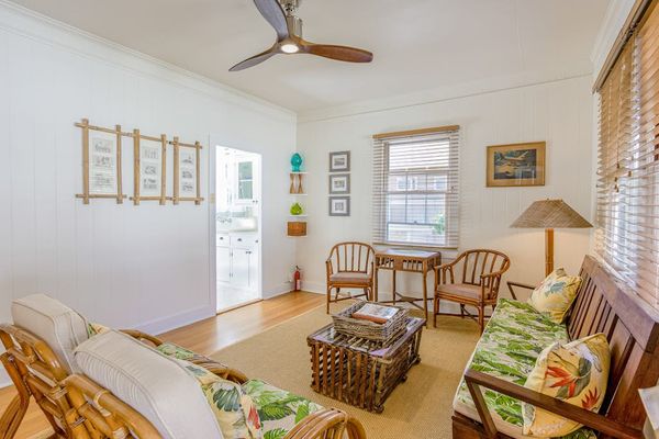 Unwind with comfortable seating in this charming cottage gathering space every evening