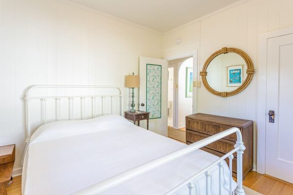 First bedroom offers a comfortable queen bed for restful nights every stay
