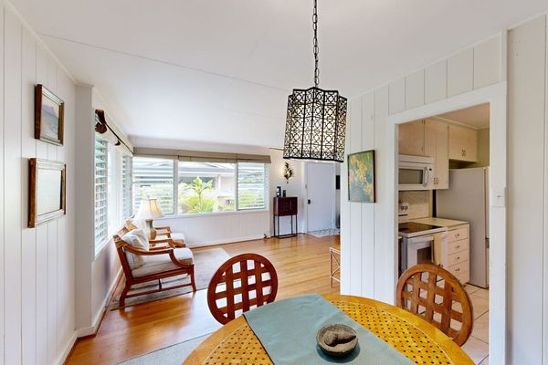 Bright dining area welcomes every meal with beautiful natural light throughout daily