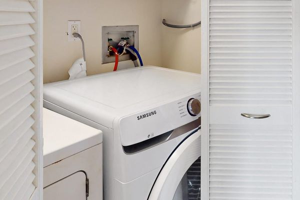 Convenient downstairs washer and dryer keep vacation essentials fresh throughout every stay