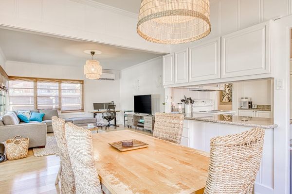 Enjoy casual meals in the airy dining room beside bright windows