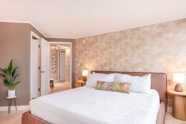Unwind in a beautifully made king bed