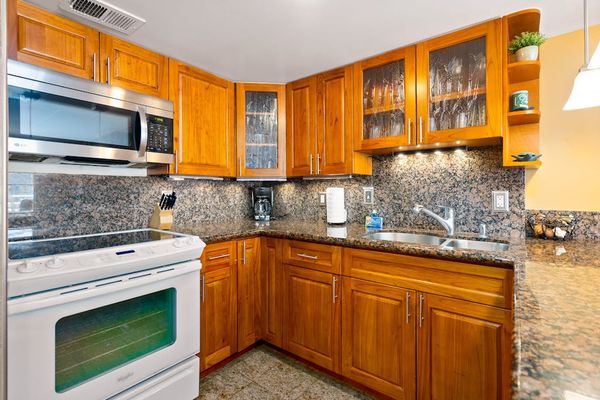 Start every morning with coffee from this bright and functional kitchen area