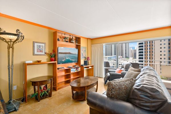 Warm wood accents create a welcoming living room for relaxing vacation moments together