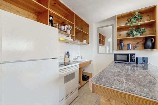 Make yourself at home with a kitchen and dining area designed for everyday comfort.