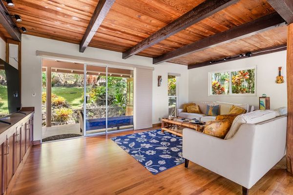 Great room with island style furnishings and space