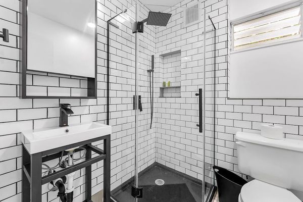 Bathroom with soaking tub and calming neutral design