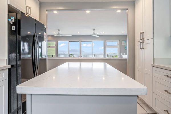 Spacious kitchen island with scenic views beyond