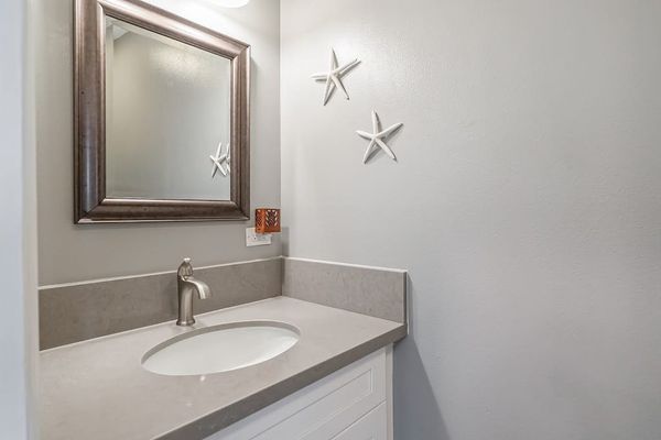 Convenient half bathroom for quick refreshes