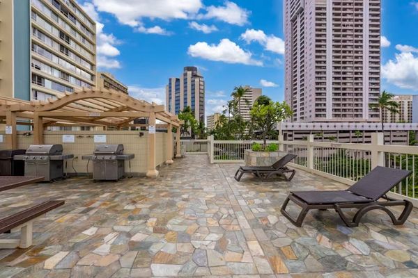 Pool deck with shared barbecues