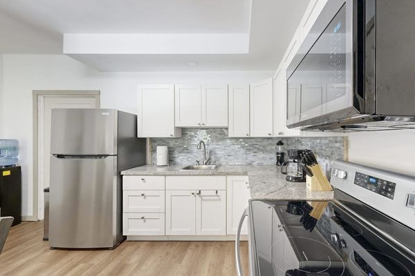 Prepare your favorite meals with ease in a fully equipped kitchen designed for your convenience.