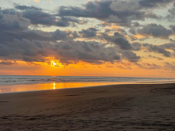 Sunset at playa Palo Seco - steps from your vacation rental