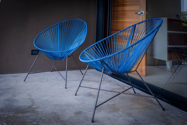 Outdoor lounge chairs on the private terrace, perfect for relaxing.