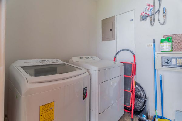 An in-unit washer and dryer make longer stays easy and convenient.
