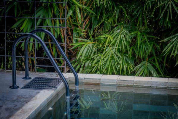 Step into the private pool and unwind in a serene tropical setting.