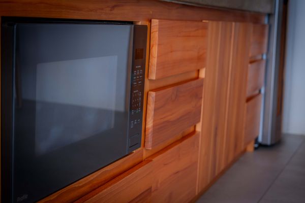 Built-in kitchen appliances add convenience for a smooth and comfortable stay.