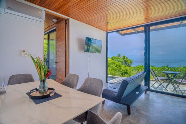 Enjoy a bright indoor space that opens to the terrace and frames beautiful Pacific views.