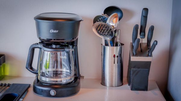 Coffee maker and kitchen essentials provided for a comfortable stay.