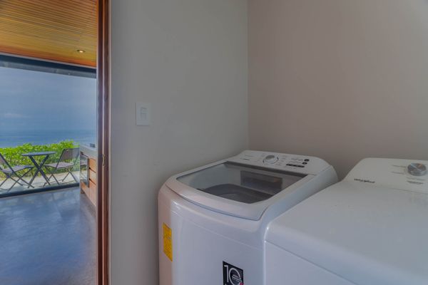 An in-unit washing machine adds extra convenience for extended stays.