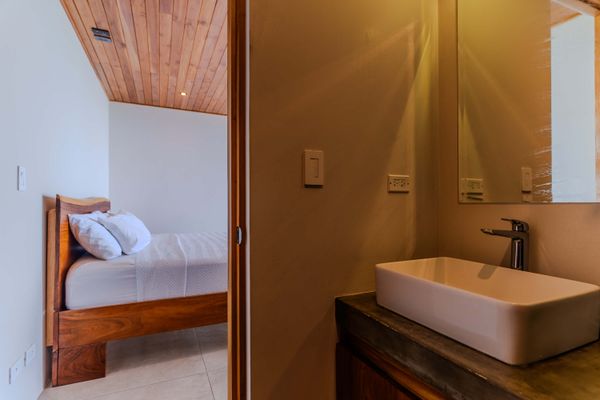 Modern ensuite bathroom with clean lines and contemporary finishes.