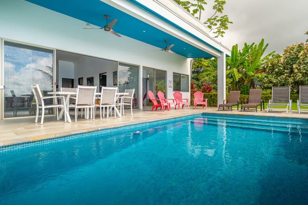 sparkling, crystal-clear pool, ideal for sunbathing and enjoying the outdoors.