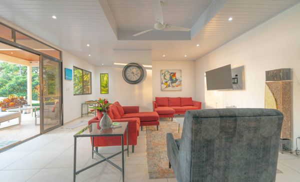 An elegant living room with a minimalist design, neutral tones, and inviting ambiance.