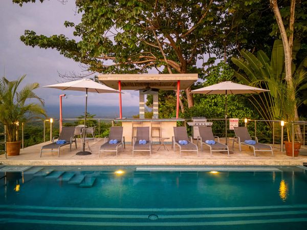 spacious pool area, ideal for swimming, lounging, and entertaining.