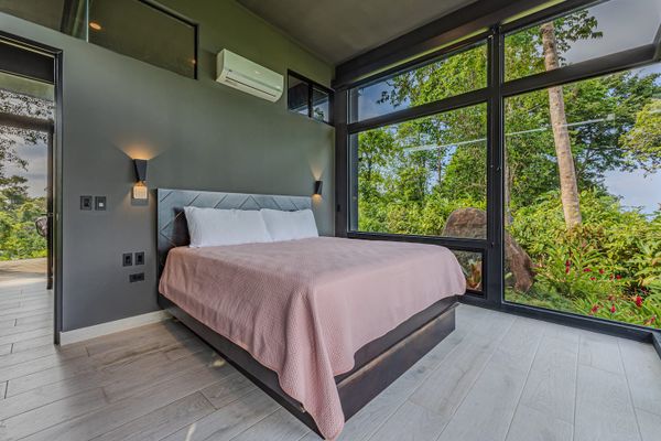 Bedroom #3 has uninterrupted views of the ocean and the jungle.