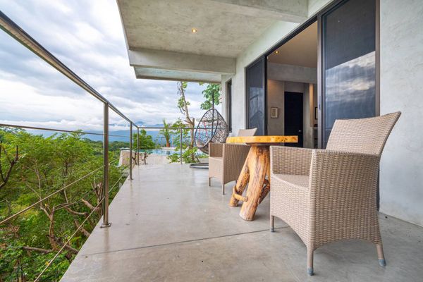 calming space to appreciate the outdoors, surrounded by lush greenery and fresh air.