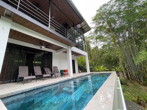 swimming pool set against the backdrop of breathtaking natural scenery.