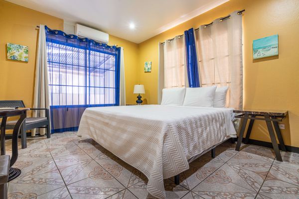 Owner's Suite with A/C and en-suite bathroom.